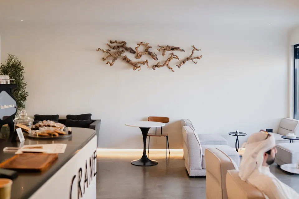 Crane café interior with the coffee bar on the left and the lounge beyond